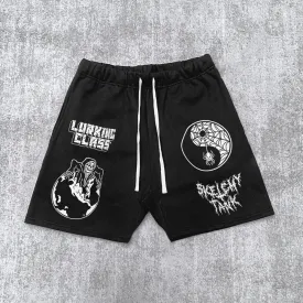 Skull print track shorts